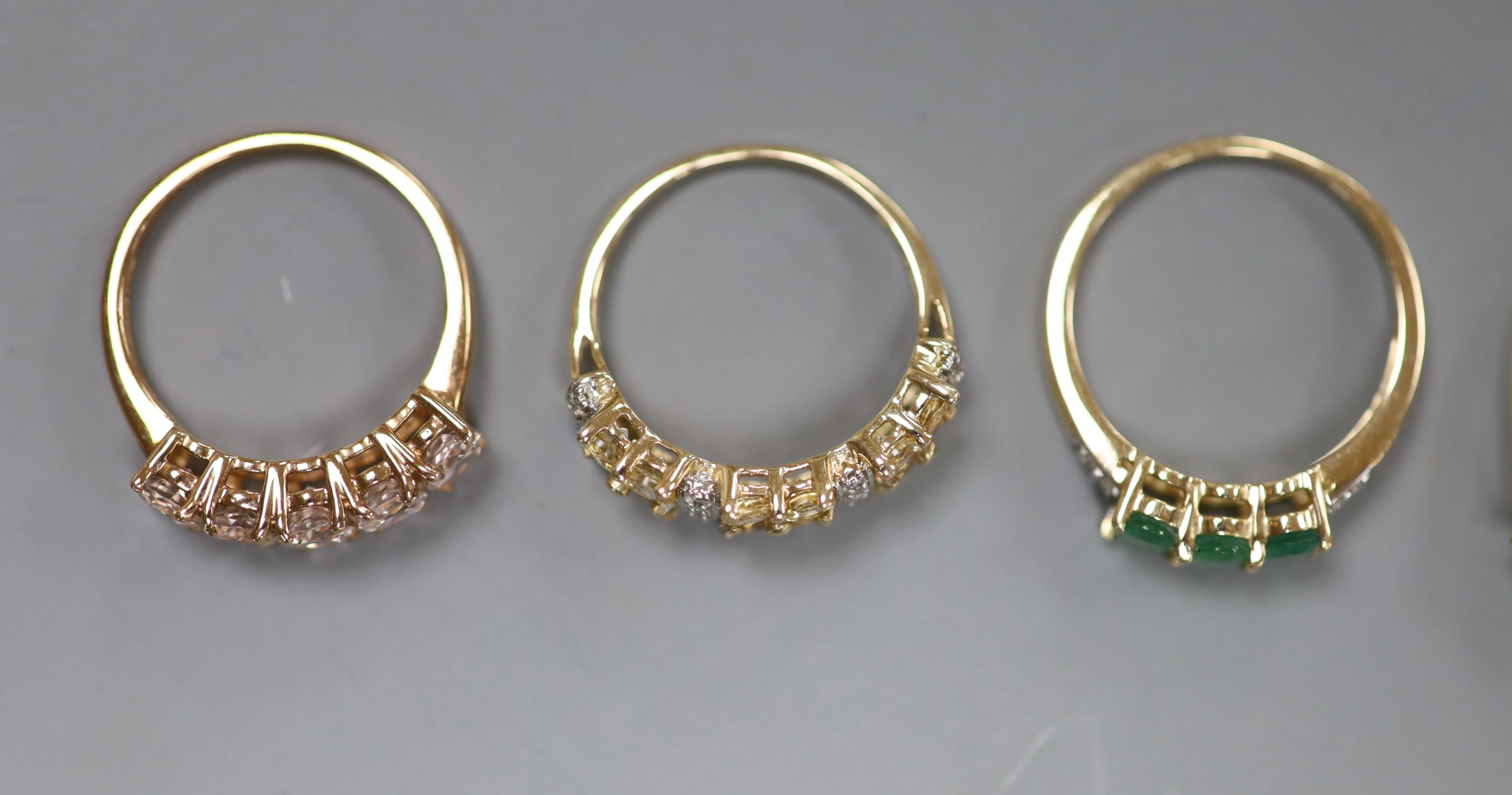Five assorted modern 9ct gold and gem set dress rings and a similar 9k ring